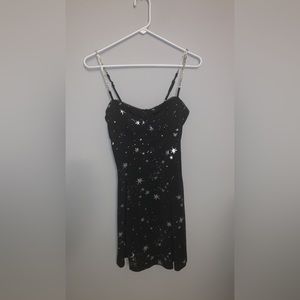 gorgeous sparkly star dress with fake diamond straps
